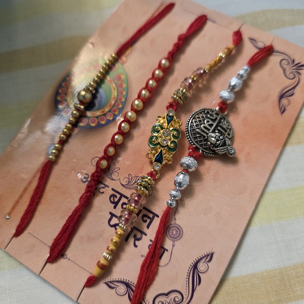 Vibrant Red and Gold Rakhi Bracelet Set